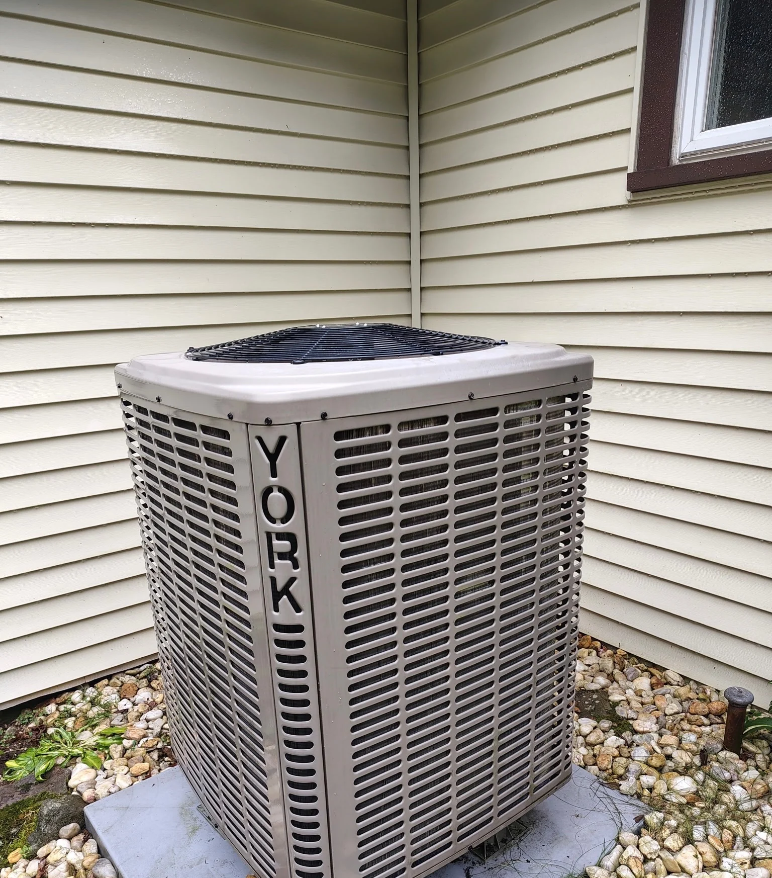 York heat pump condenser installed outside a home