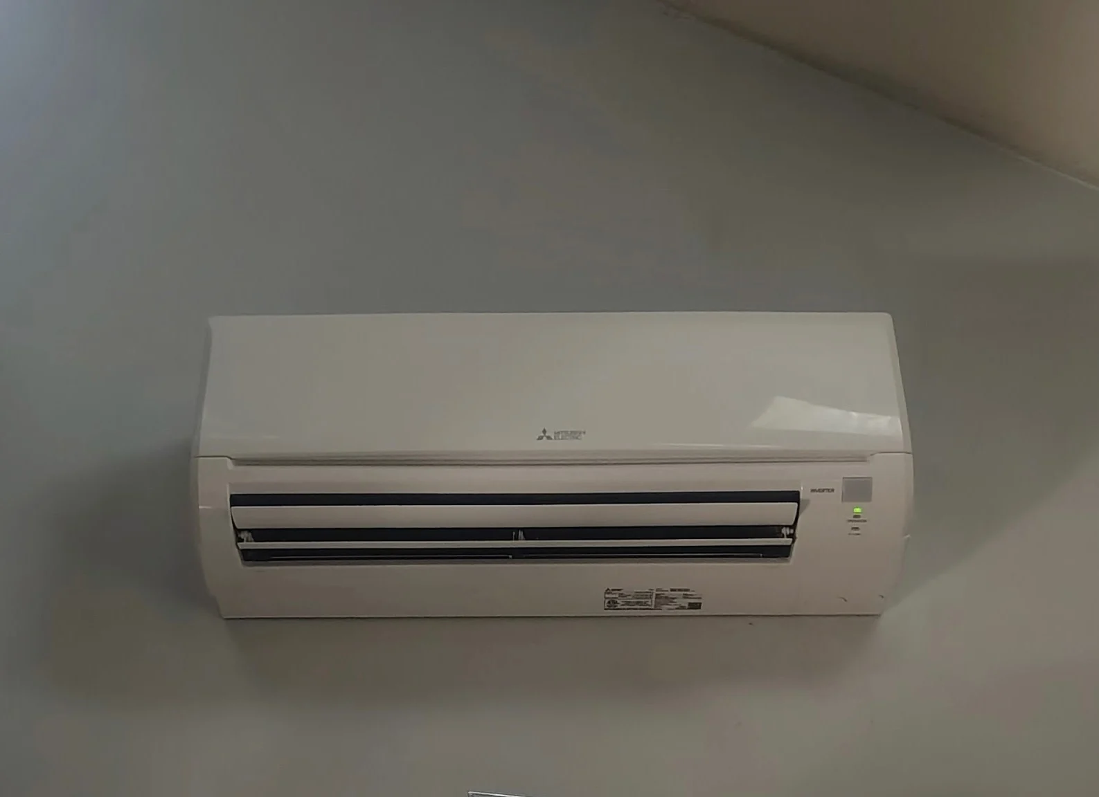 Mitsubishi Electric ductless mini-split indoor unit installed on a customer's wall