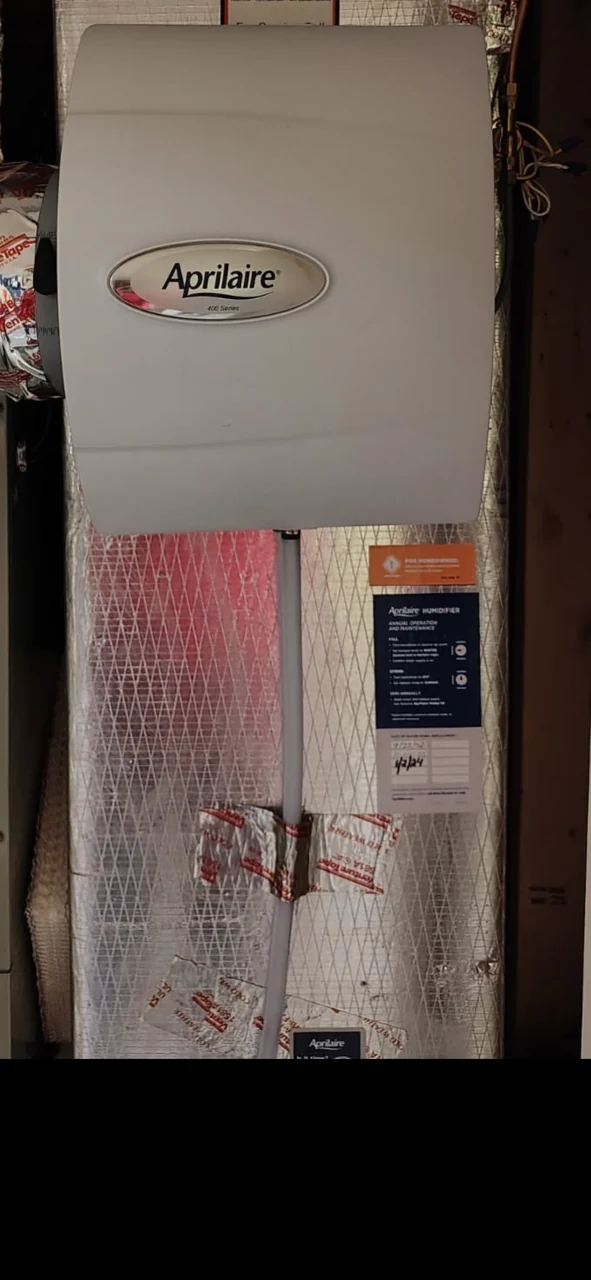 Aprilaire whole-home humidifier installed on a customer's ductwork